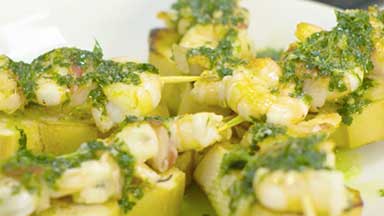 Prawn and bacon brochette with garlic and parsley dressing